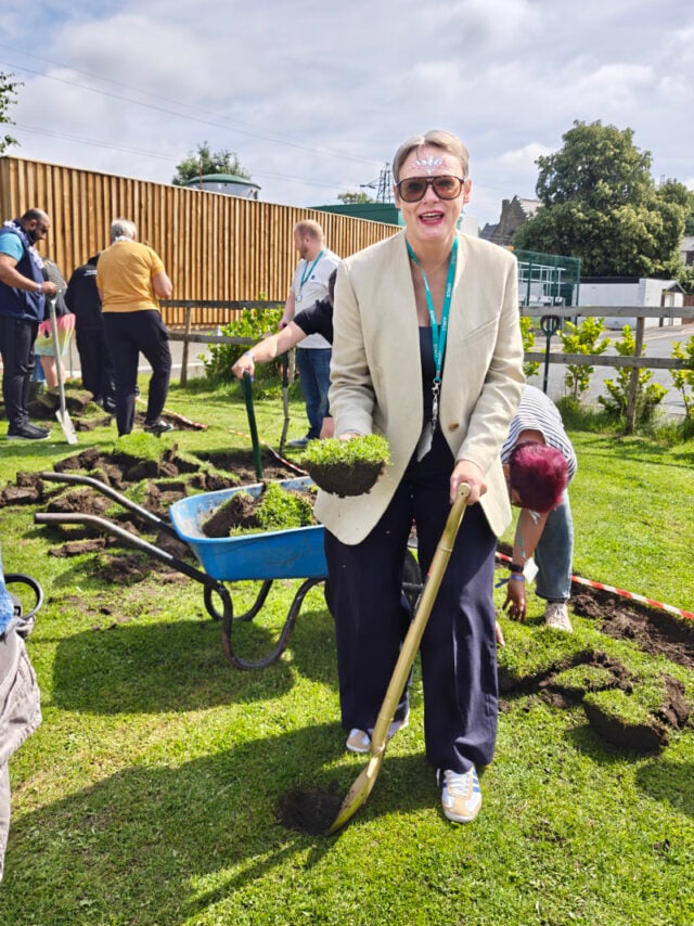 Lisa helping create a 20 years of Ofsted outstanding garden at the Nelson campus.