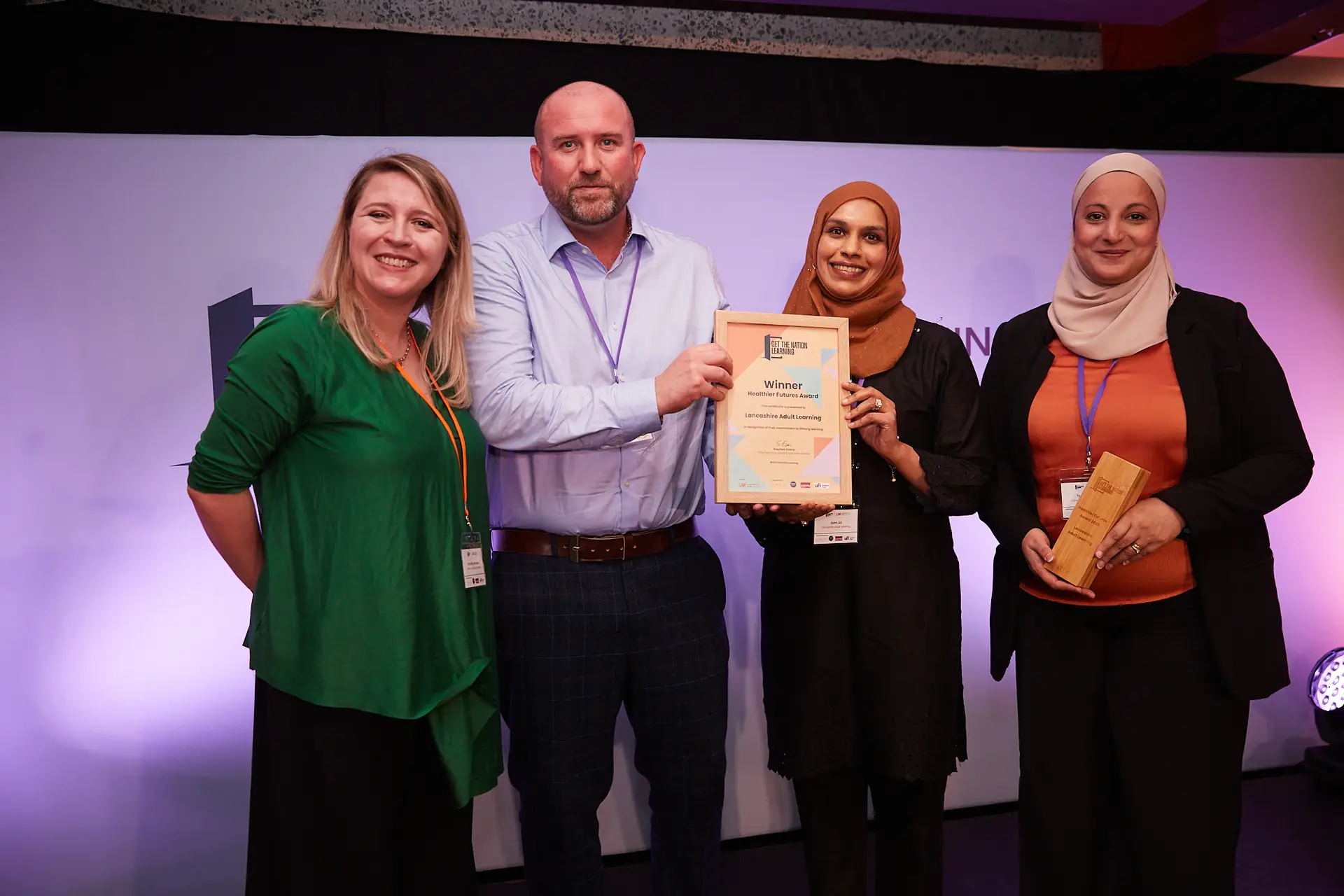 Lancashire Adult Learning team collecting the ‘Healthier Futures’ Award at the Get the Nation Learning Awards 2025